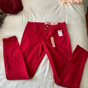 Brand new with tags red skinny jeans